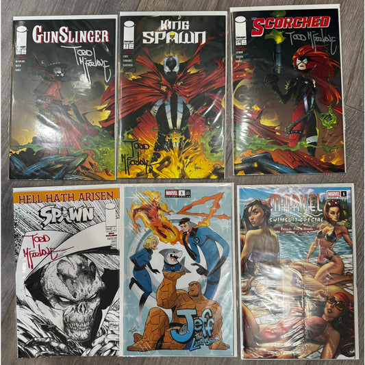 4 Signed McFarlane SDCC Comic Exclusives and two SDCC comics
